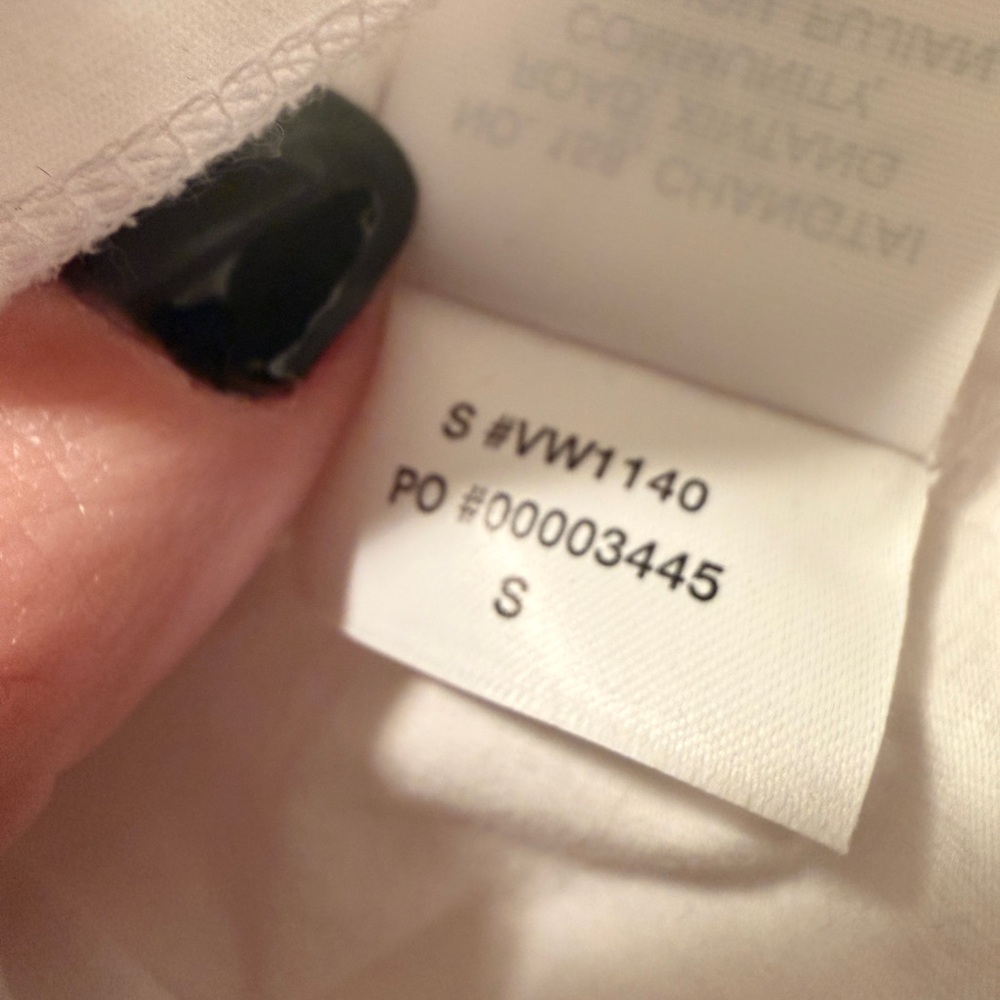 Cropped White Tee with Split Back Hem Detail - image 4